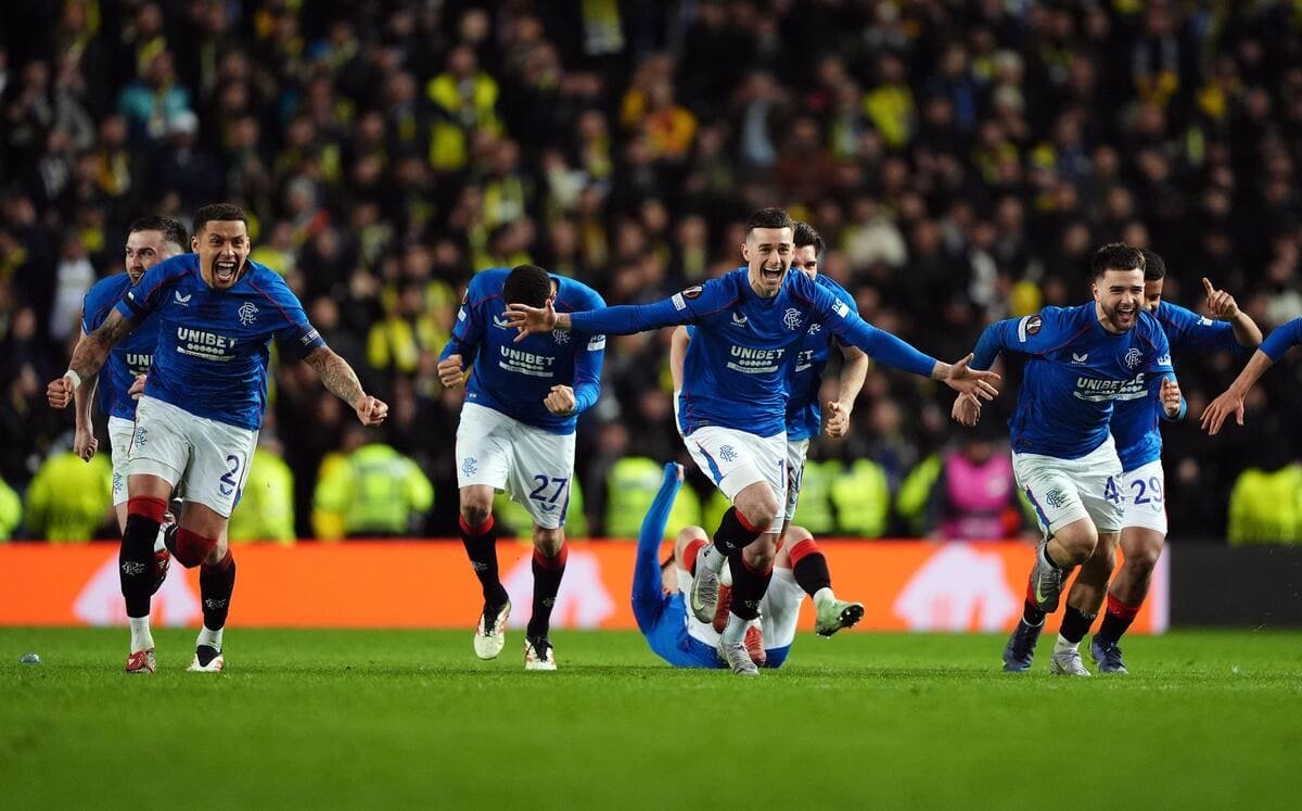 Rangers players celebrate.