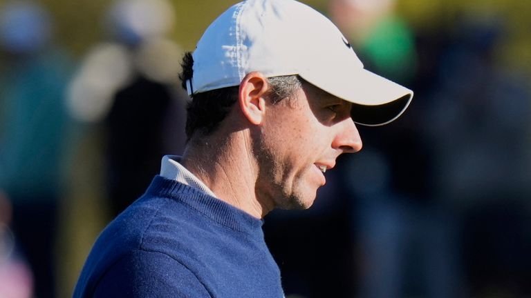 Rory McIlroy, right, of Northern Ireland, reacts after making a putt on the 16th hole during a playoff round of The Players Championship golf tournament Monday, March 17, 2025, in Ponte Vedra Beach, Fla. (AP Photo/Chris O'Meara)