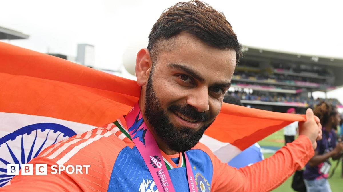 Virat Kohli celebrates with the flag of India after his side's T20 World Cup win in 2024