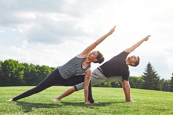 Couple Does Side Angle Pose Outside | Yoga and Meditation